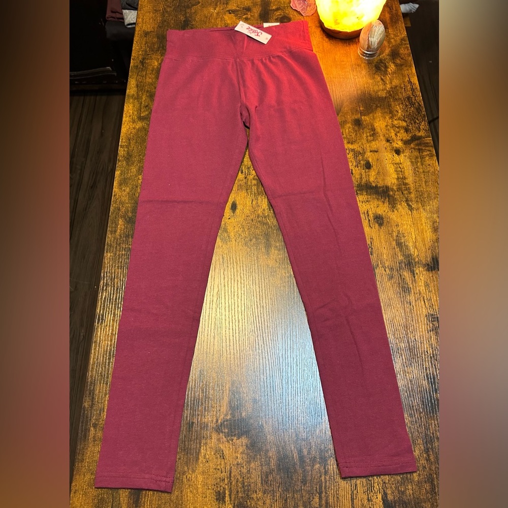 Justice slim ankle pant plum color size 14/16